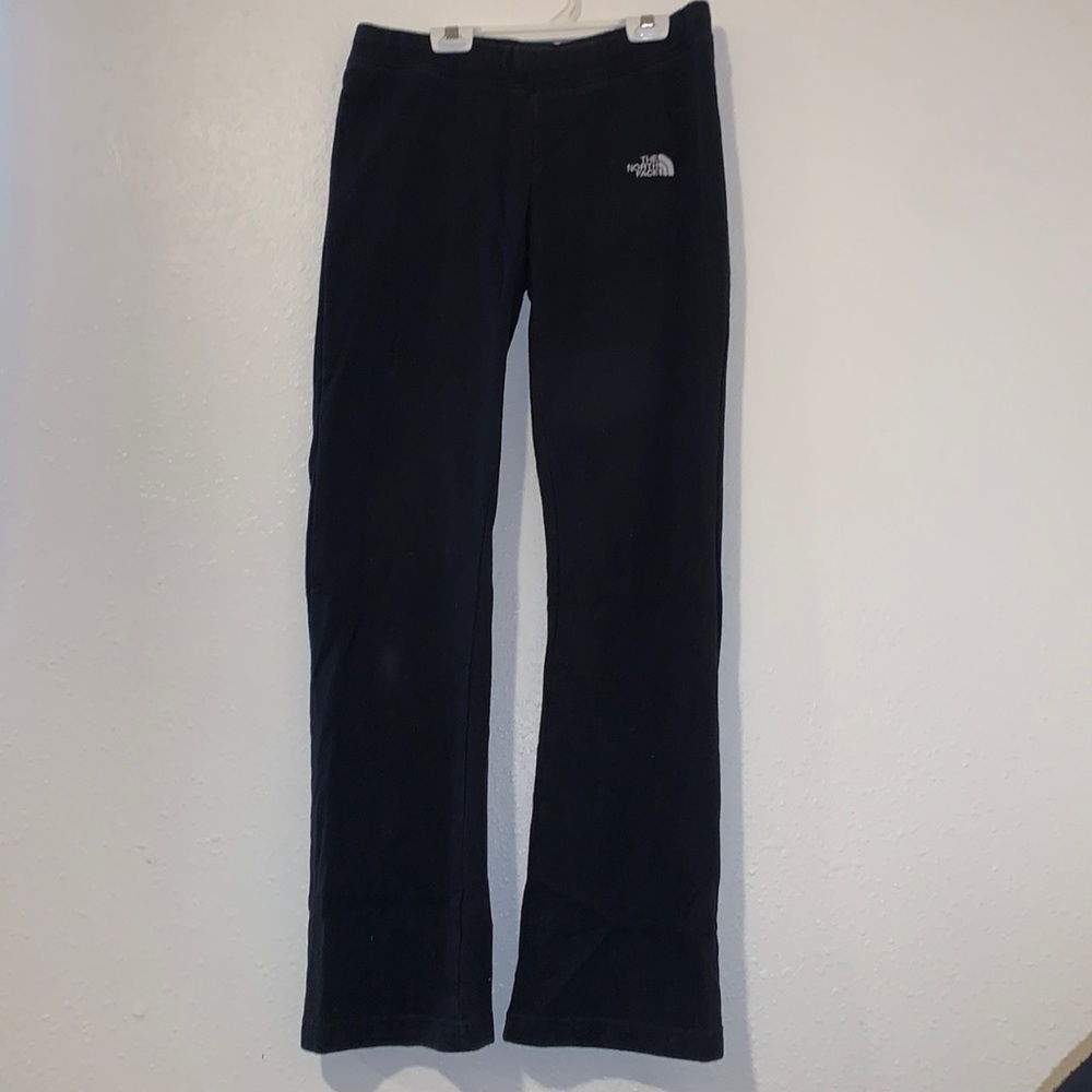 Black North Face sweatpants with drawstring. Size Medium. In perfect condition